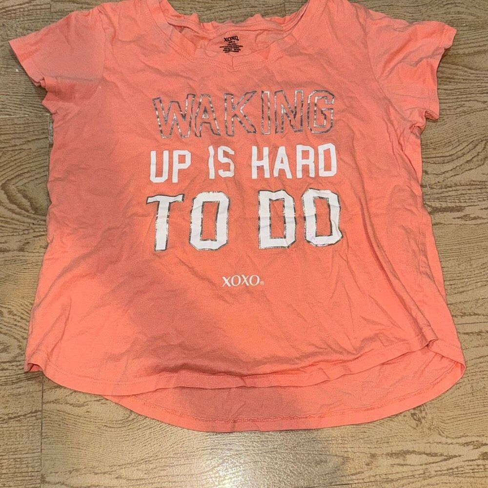 Xoxo 100% cotton coral graphic T-shirt with the text "WAKING UP IS HARD TO DO" s